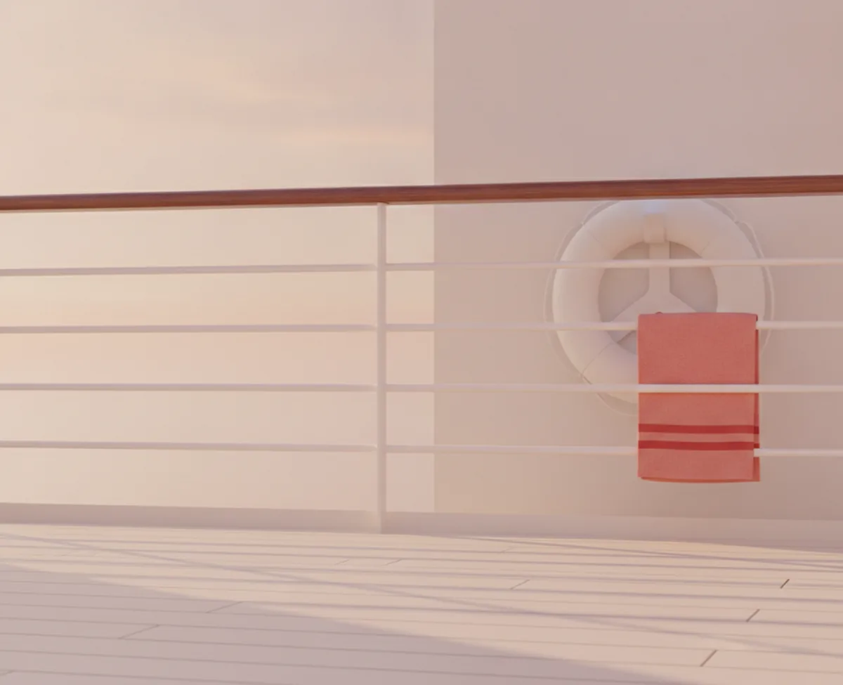 An empty ship's deck at golden hour: a white railing with a wooden top rail, a coral-striped towel folded over it and a plain unmarked ring buoy on the pale wall behind