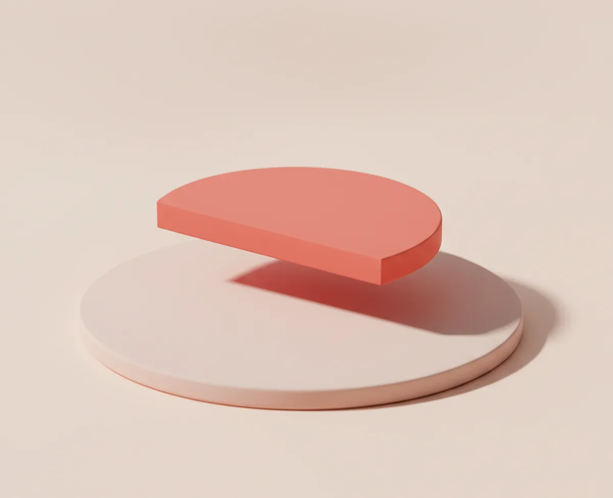 A coral half-disc floating just above a plain blush disc on a warm off-white surface, its shadow falling across the disc below