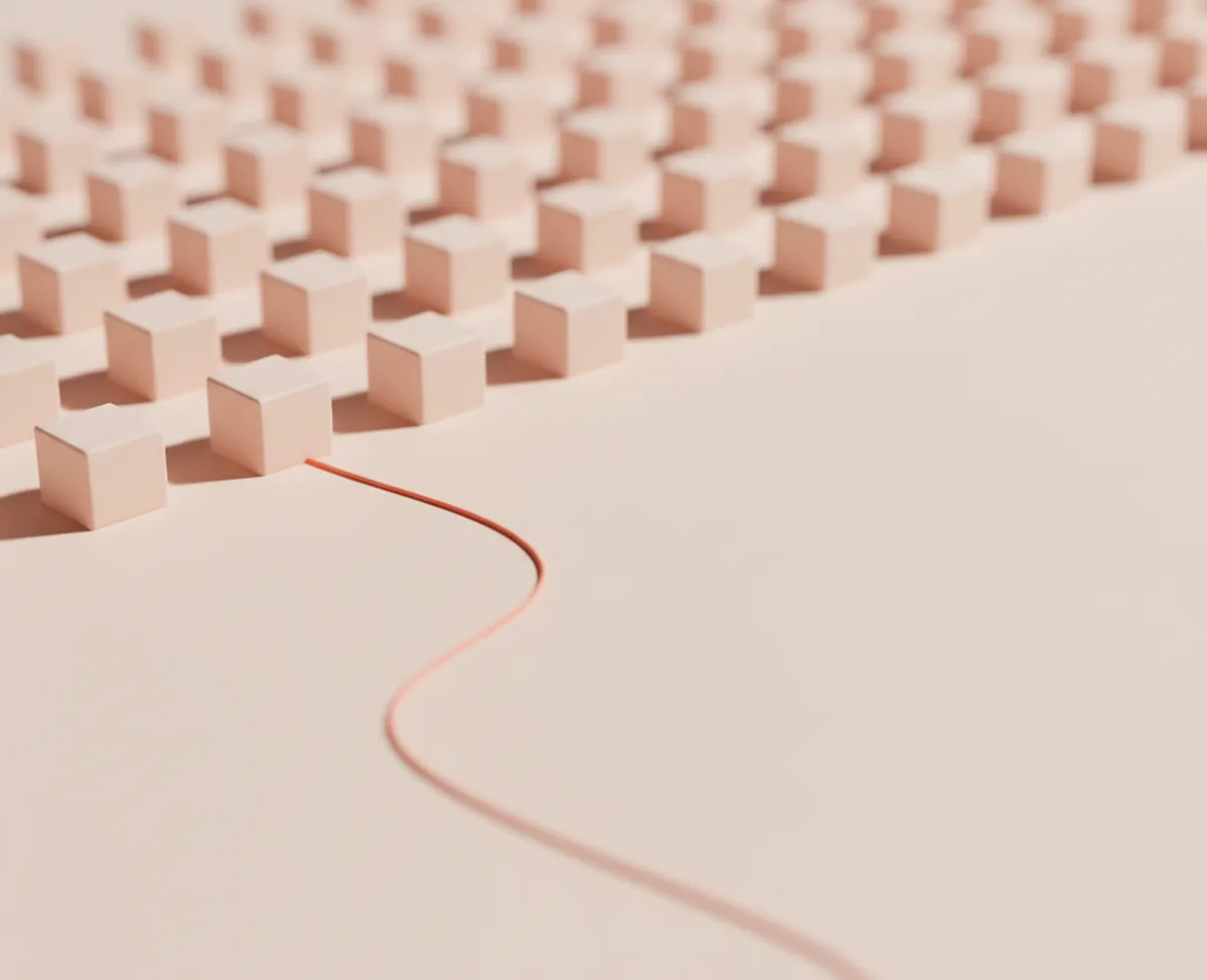 A field of small blush cubes receding across a warm off-white floor, with a slim coral thread curving in from the foreground and ending at one cube in the front row